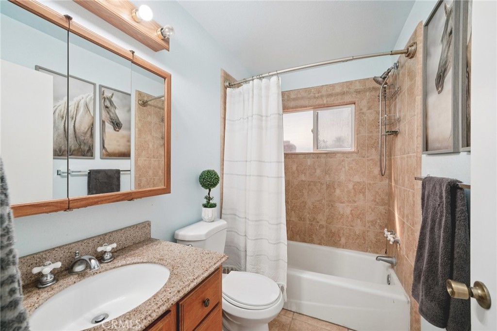 2821 Riding Ring Road Norco, CA 92860 - Photo 30 of 54 a bathroom with a sink toilet and shower