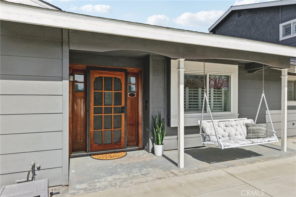 2821 Riding Ring Road Norco, CA 92860 - Photo 3 of 54 a front view of a house with a potted plant and empty room