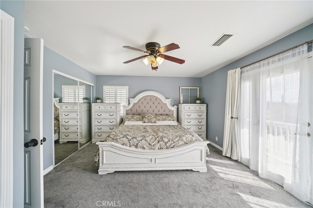 2821 Riding Ring Road Norco, CA 92860 - Photo 33 of 54 a living room with furniture a window and a chandelier
