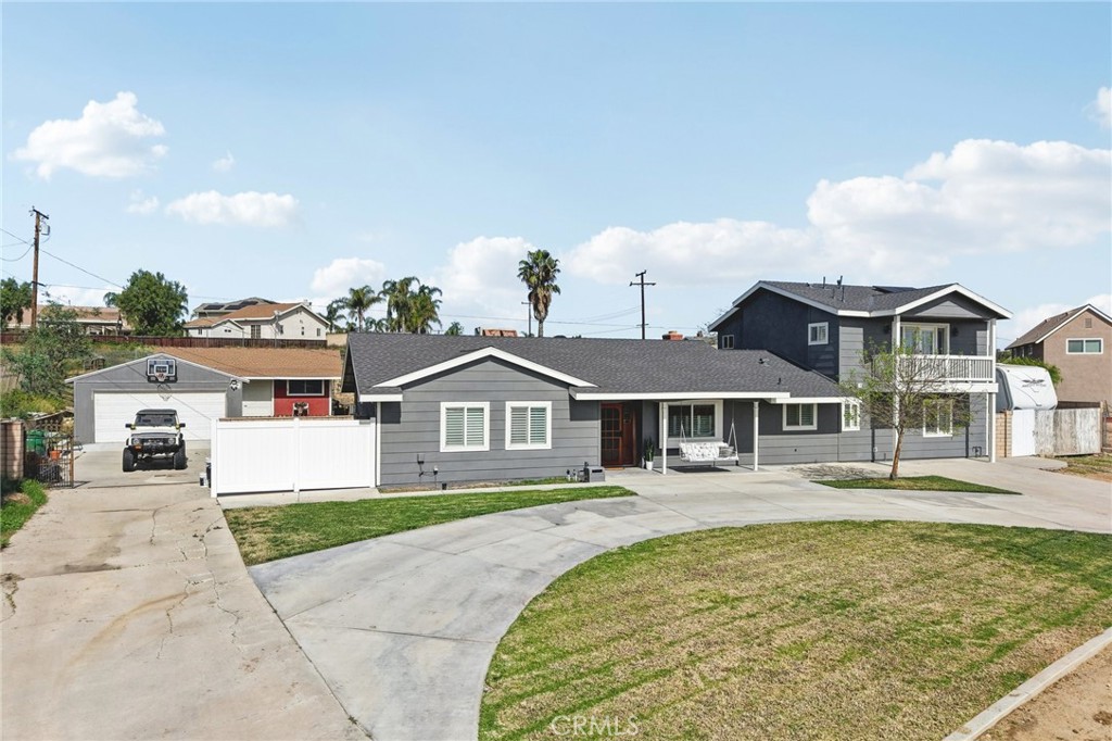 2821 Riding Ring Road Norco, CA 92860 - Photo 45 of 54 a front view of a house with a garden and lake view