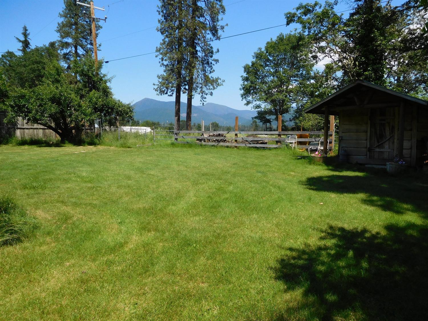 5685 Holland Loop Road Cave Junction, OR 97523 - Photo 4 of 18 View of Grayback mountain and the garden