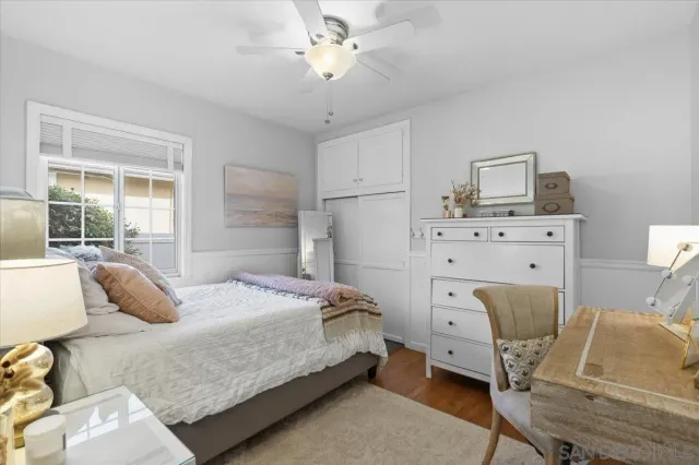 a bedroom with a bed and furniture