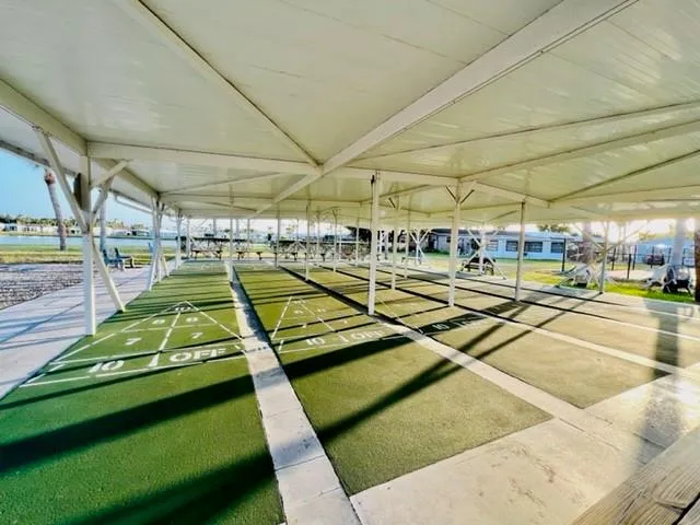 a view of a gym with lots of chairs