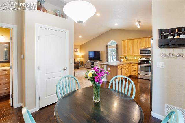 31 Wahsatch Road Florissant, CO 80816 - Photo 15 of 46 Dining area with pantry, kitchen and living room