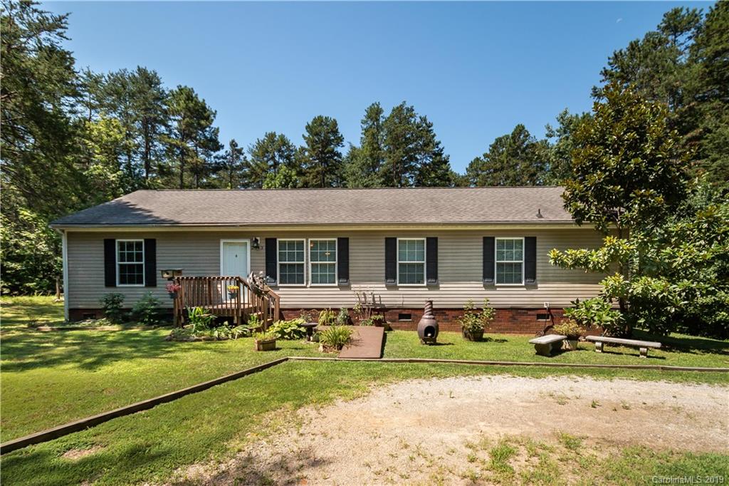 2843 Fay Jones Road Denver, NC 28037 - Photo 1 of 27 a front view of house with yard outdoor seating and barbeque oven