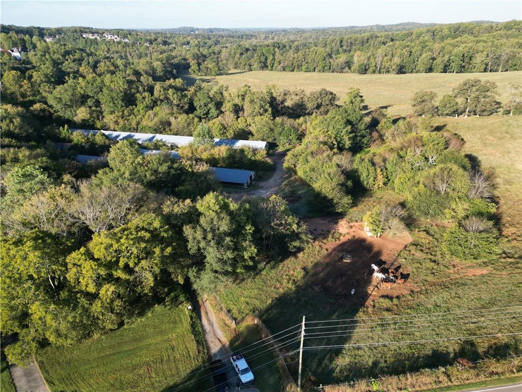 4592 Waters Road Woodstock, GA 30188 - Photo 20 of 22 a view of a houses with a yard