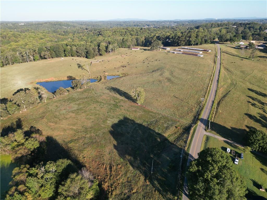 4592 Waters Road Woodstock, GA 30188 - Photo 2 of 22 a view of a lake with a mountain
