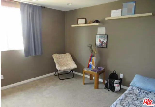 a room with furniture and a couch