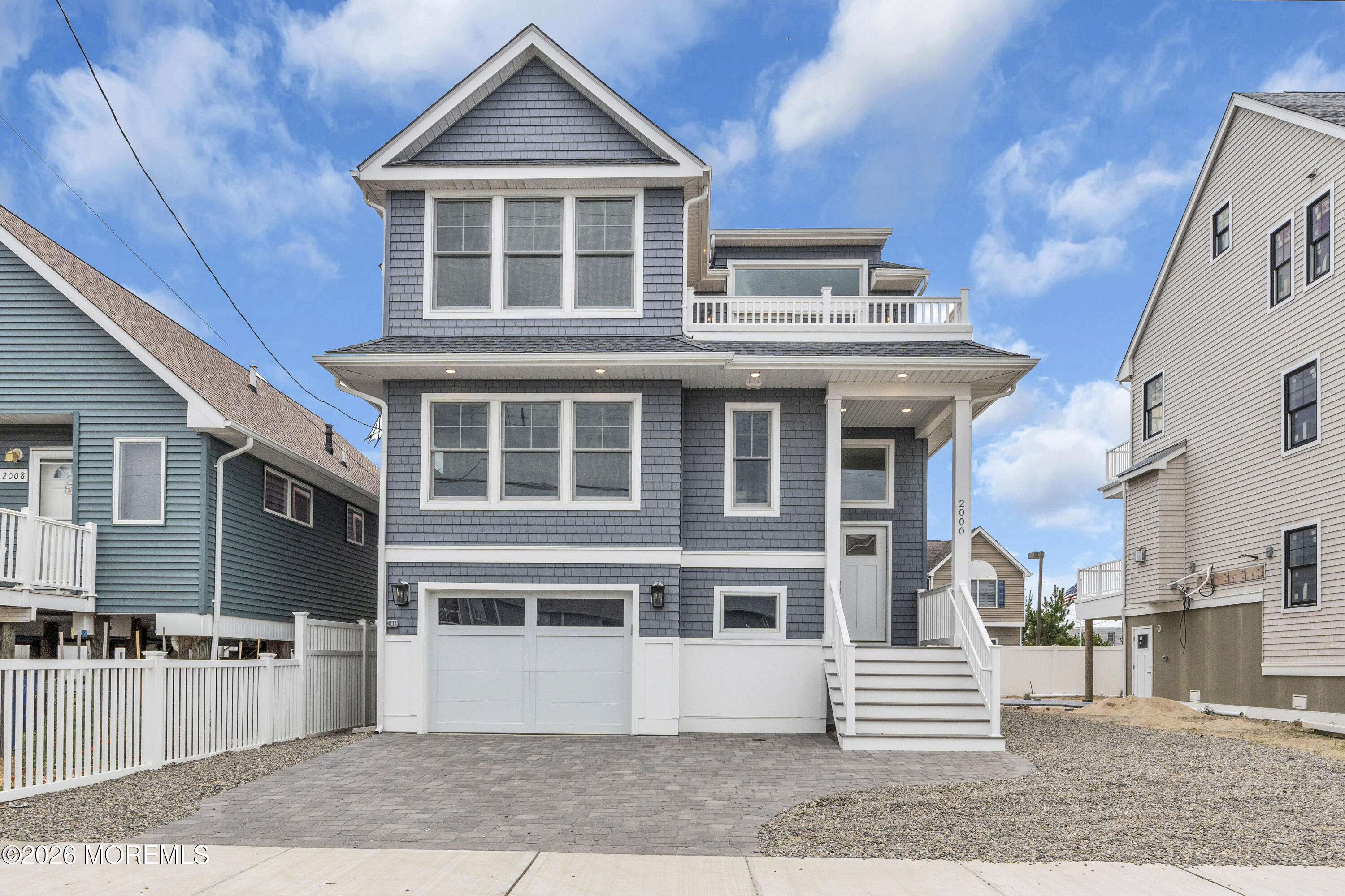 2000 Highway 35 Seaside Heights, NJ 08751 - Photo 1 of 26 a front view of a house with a yard