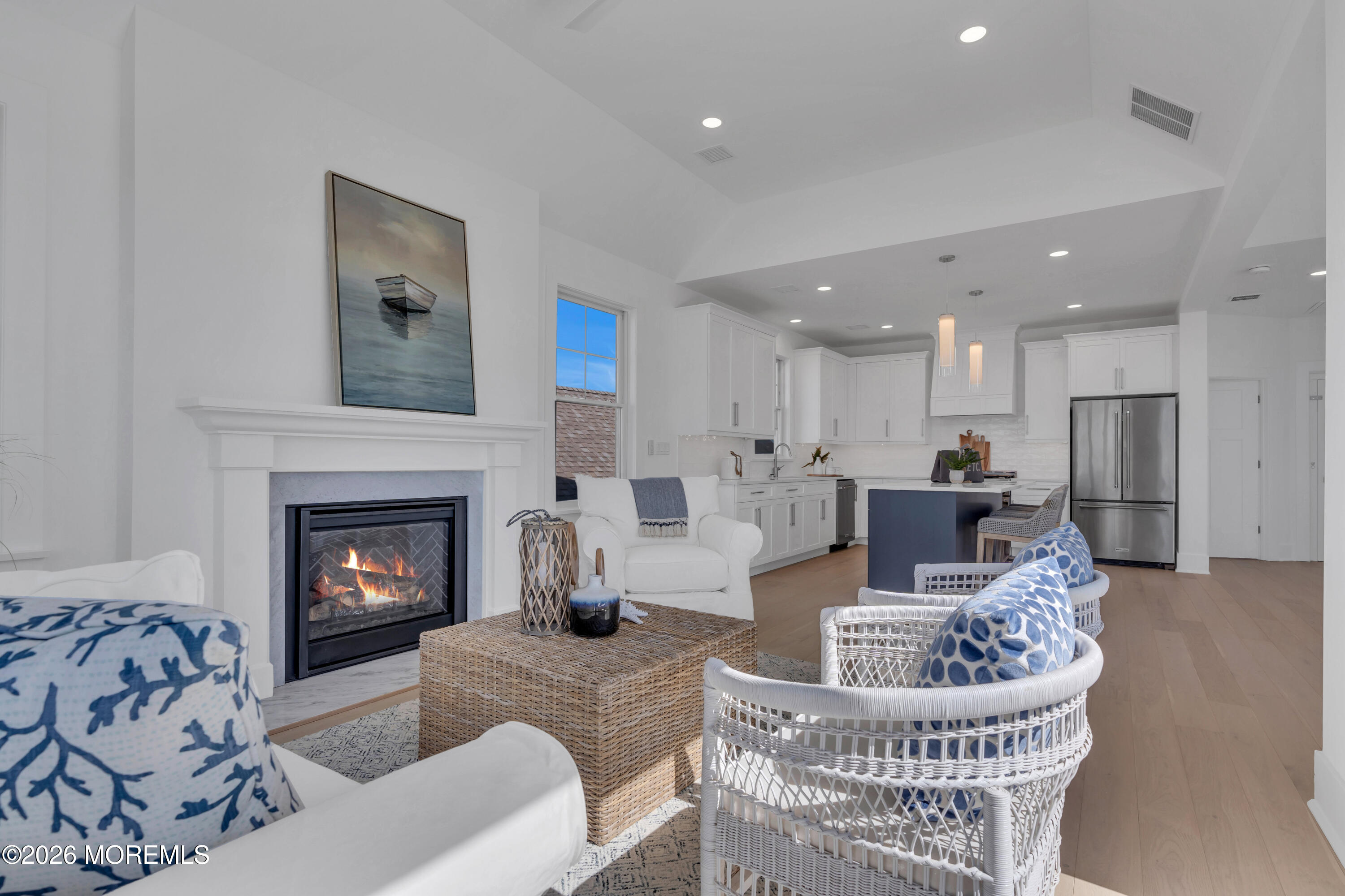 2000 Highway 35 Seaside Heights, NJ 08751 - Photo 11 of 26 a living room with furniture a fireplace and kitchen view