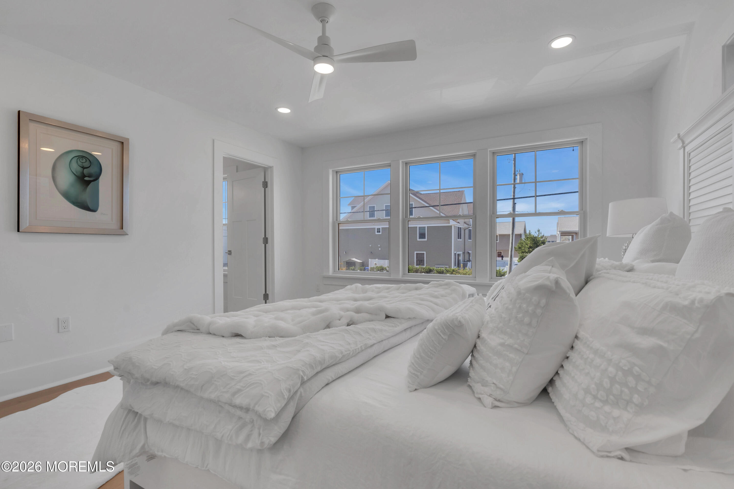 2000 Highway 35 Seaside Heights, NJ 08751 - Photo 22 of 26 a bedroom with a bed and a large mirror