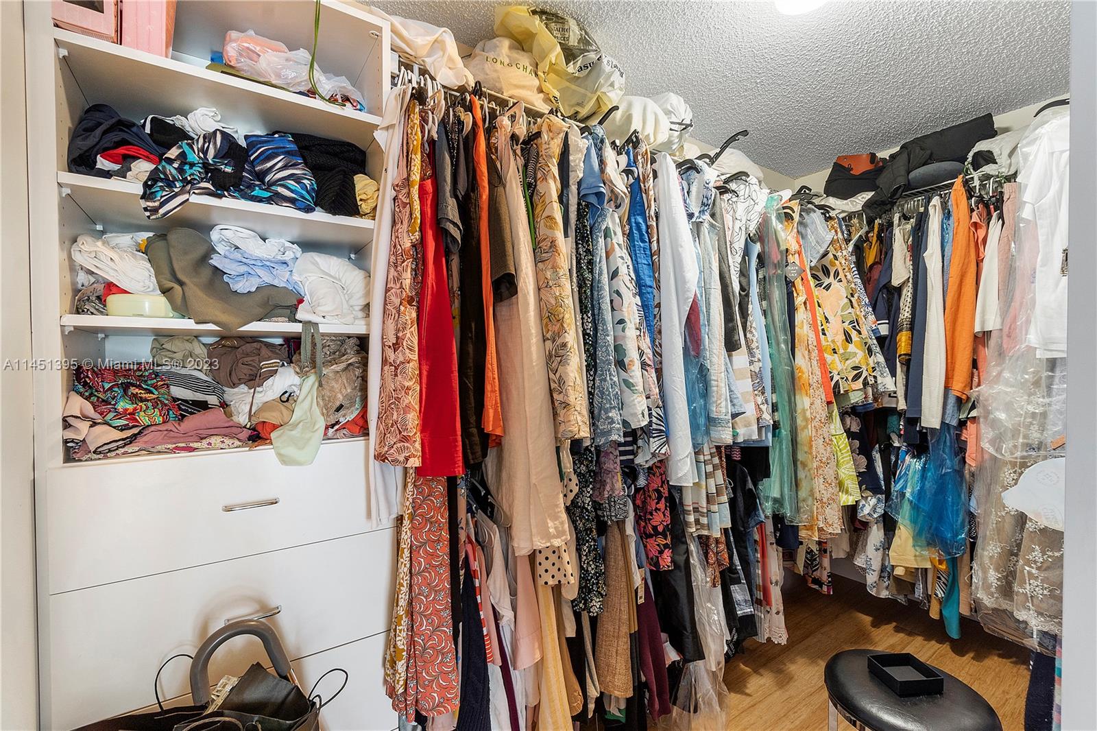 6157 Old Court Road, Unit 225 Boca Raton, FL 33433 - Photo 14 of 27 a view of walk in closet with clothes