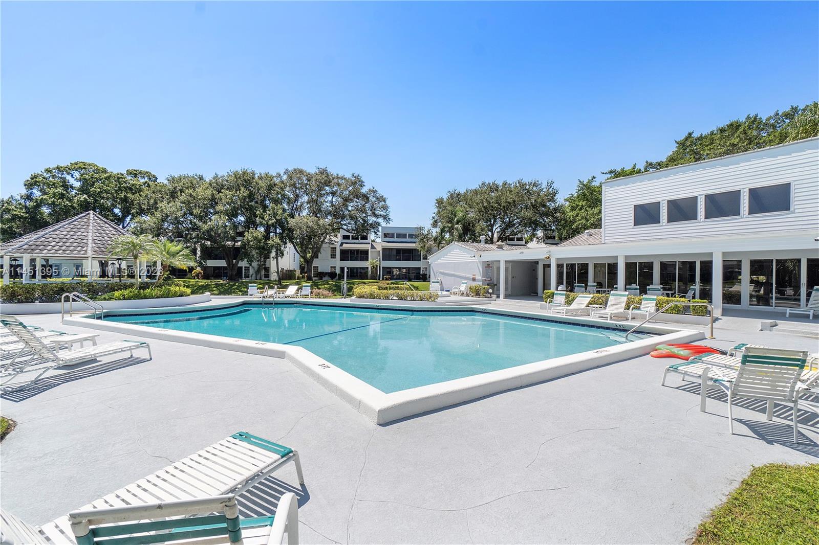 6157 Old Court Road, Unit 225 Boca Raton, FL 33433 - Photo 20 of 27 a house with swimming pool in front of it