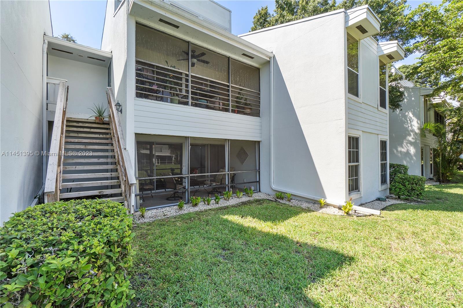 6157 Old Court Road, Unit 225 Boca Raton, FL 33433 - Photo 21 of 27 a view of front door and yard
