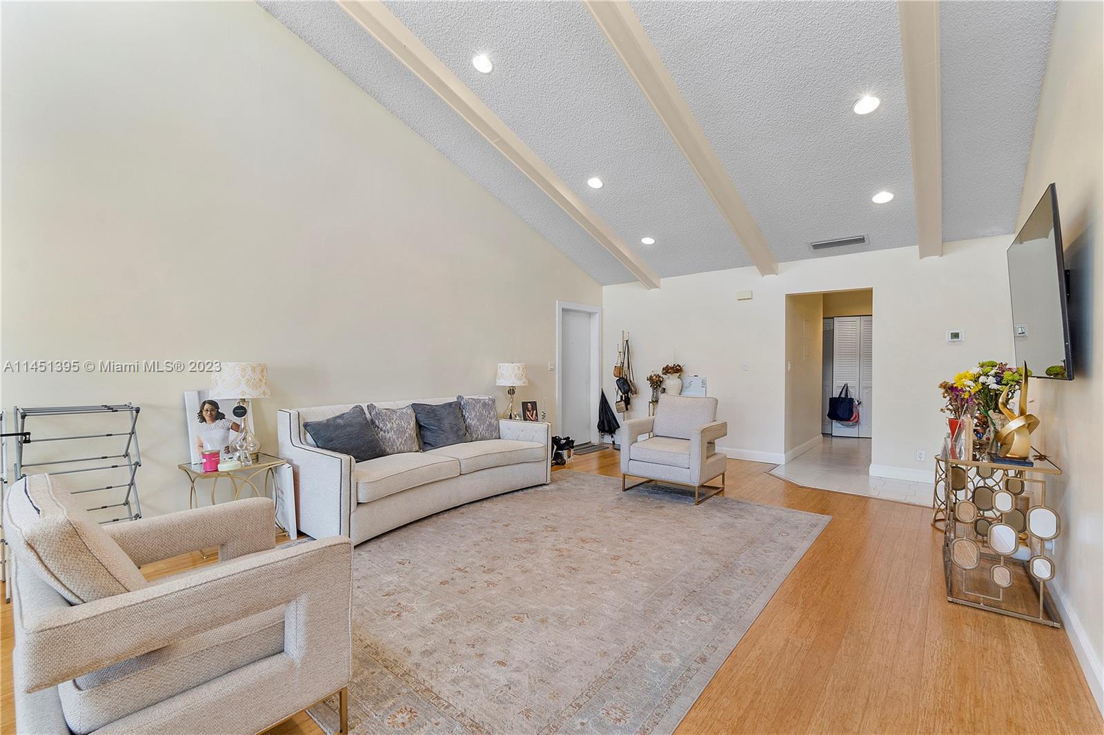 6157 Old Court Road, Unit 225 Boca Raton, FL 33433 - Photo 22 of 27 a living room with furniture and wooden floor