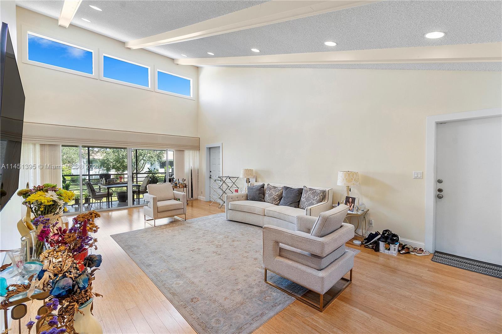 6157 Old Court Road, Unit 225 Boca Raton, FL 33433 - Photo 7 of 27 a living room with furniture and a large window
