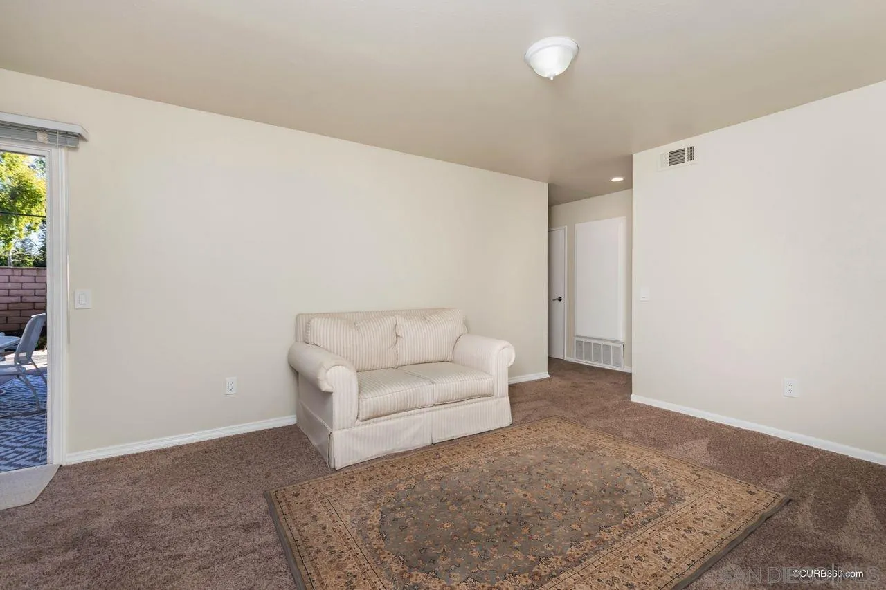 2750 Persimmon Place Riverside, CA 92506 - Photo 10 of 23 a living room with furniture and a rug
