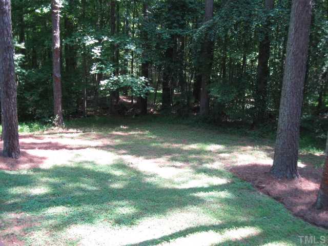 8316 Wheatstone Lane Raleigh, NC 27613 - Photo 4 of 22 View of back yard from deck