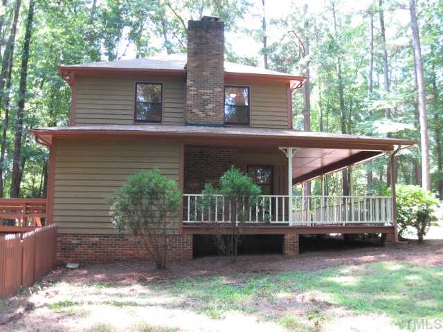 8316 Wheatstone Lane Raleigh, NC 27613 - Photo 5 of 22 View of left side of home