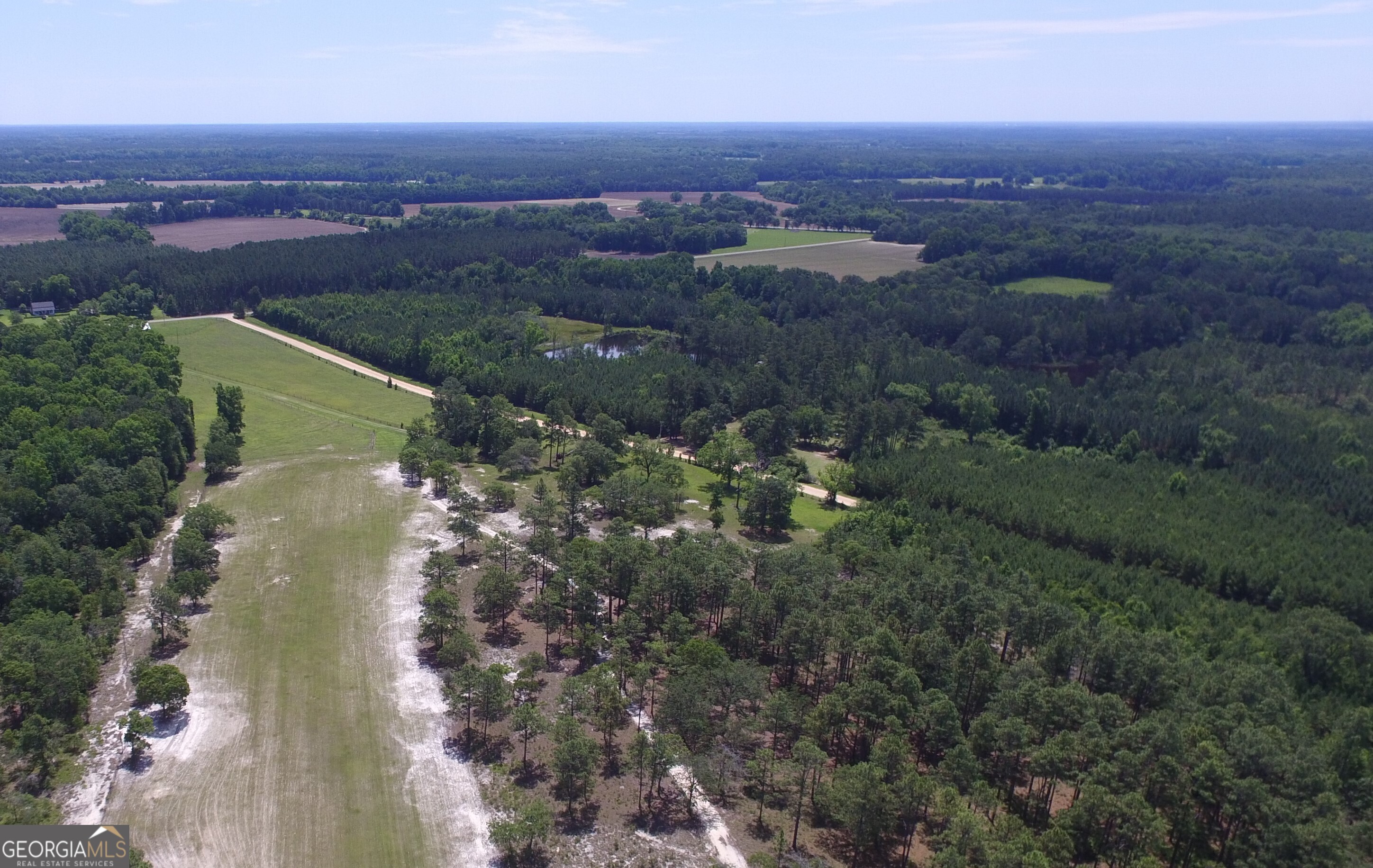 0 Ben Grady Collins Road, Unit LOT 1 Statesboro, GA 30450 - Photo 6 of 6 an aerial view of residential house with outdoor space and trees