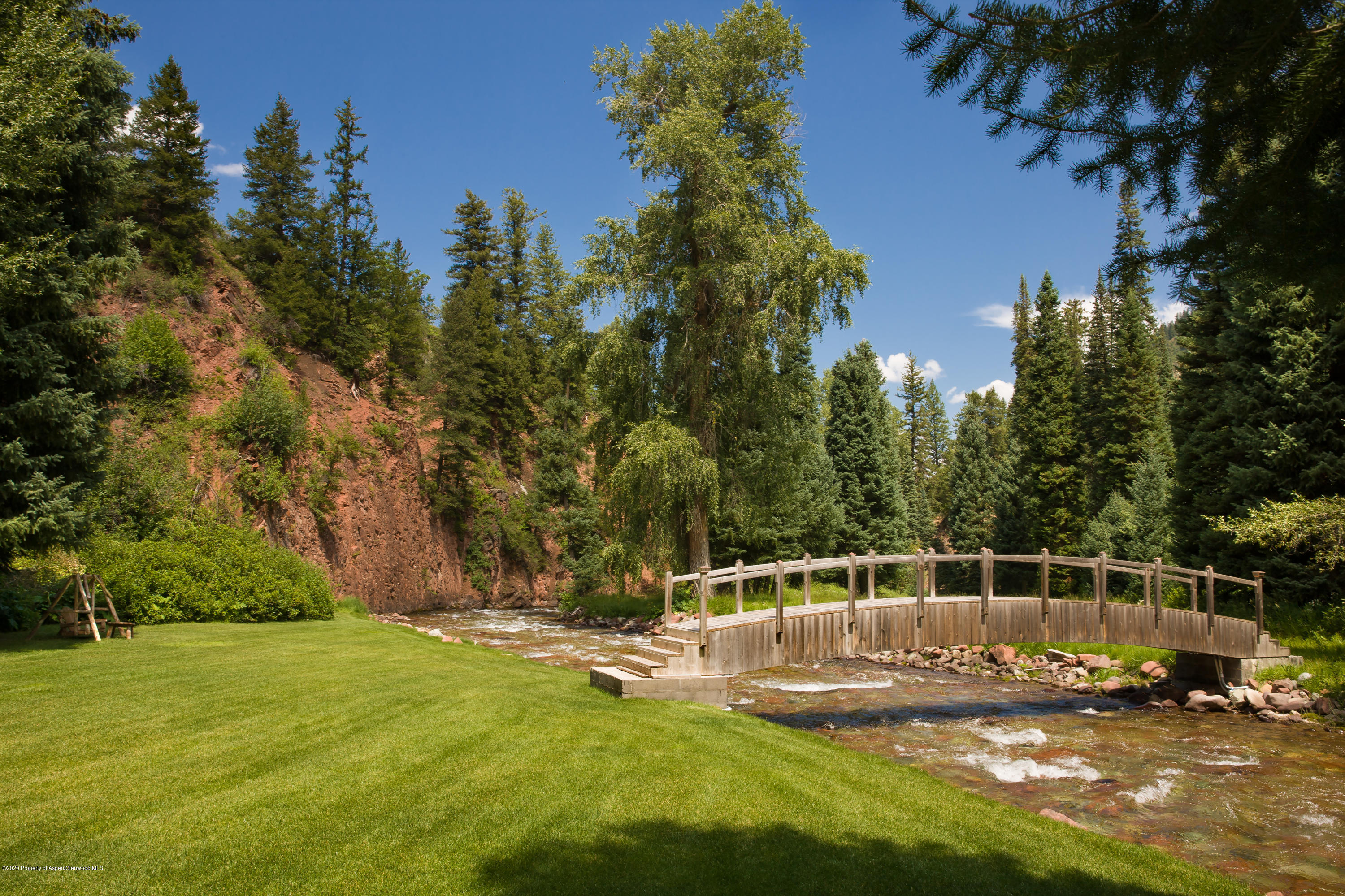 201 Midnight Mine Road Aspen, CO 81611 - Photo 13 of 40 a view of a house with backyard
