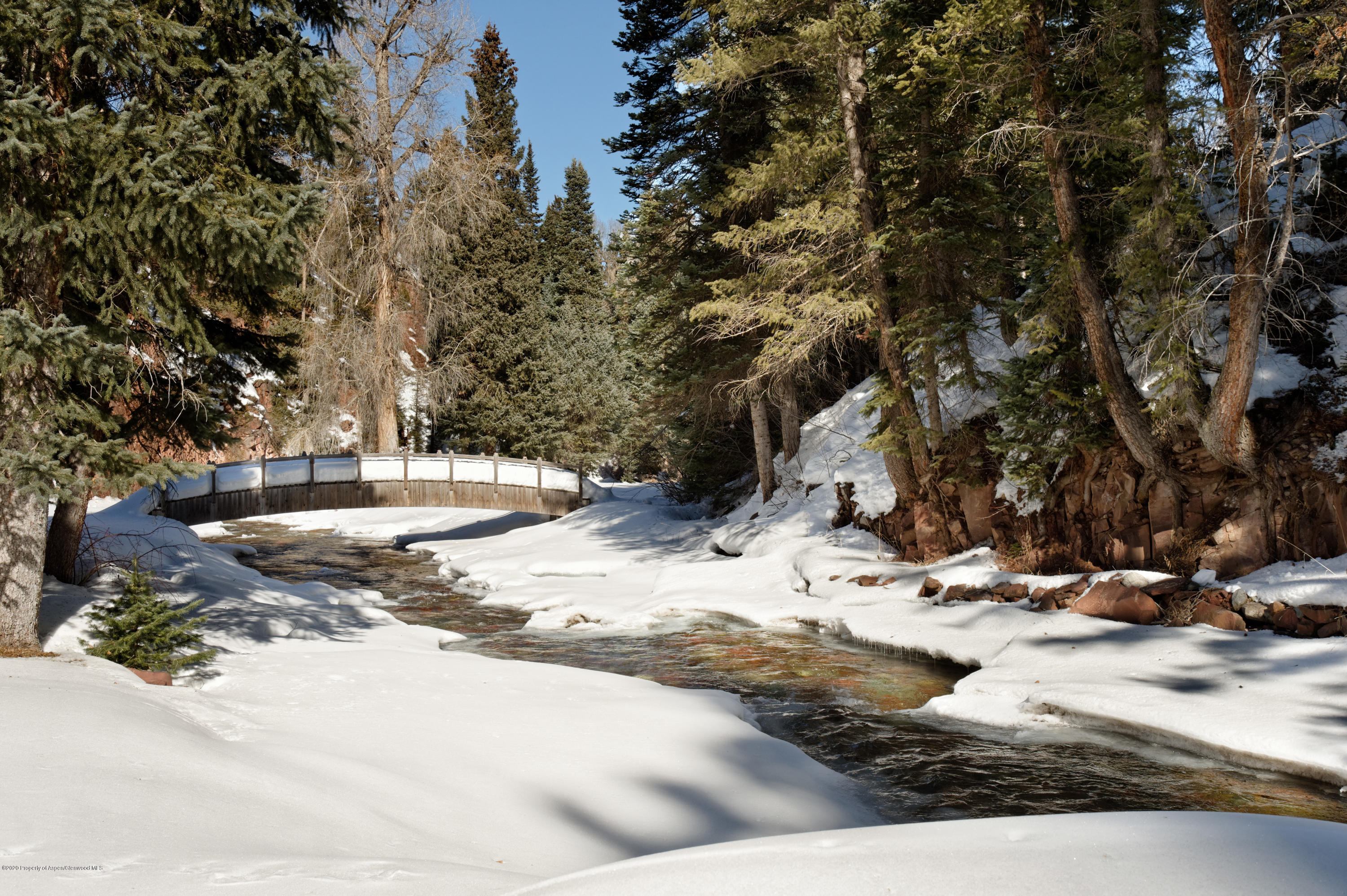 201 Midnight Mine Road Aspen, CO 81611 - Photo 20 of 40 a view of a road with a snow on the road