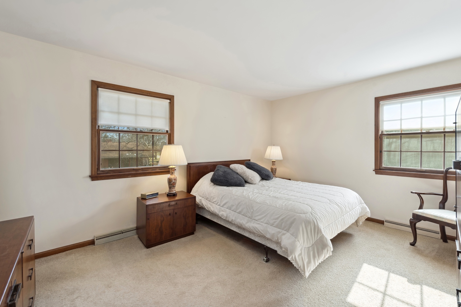 243 South Wulff Street Cary, IL 60013 - Photo 15 of 27 a bedroom with a bed and a window