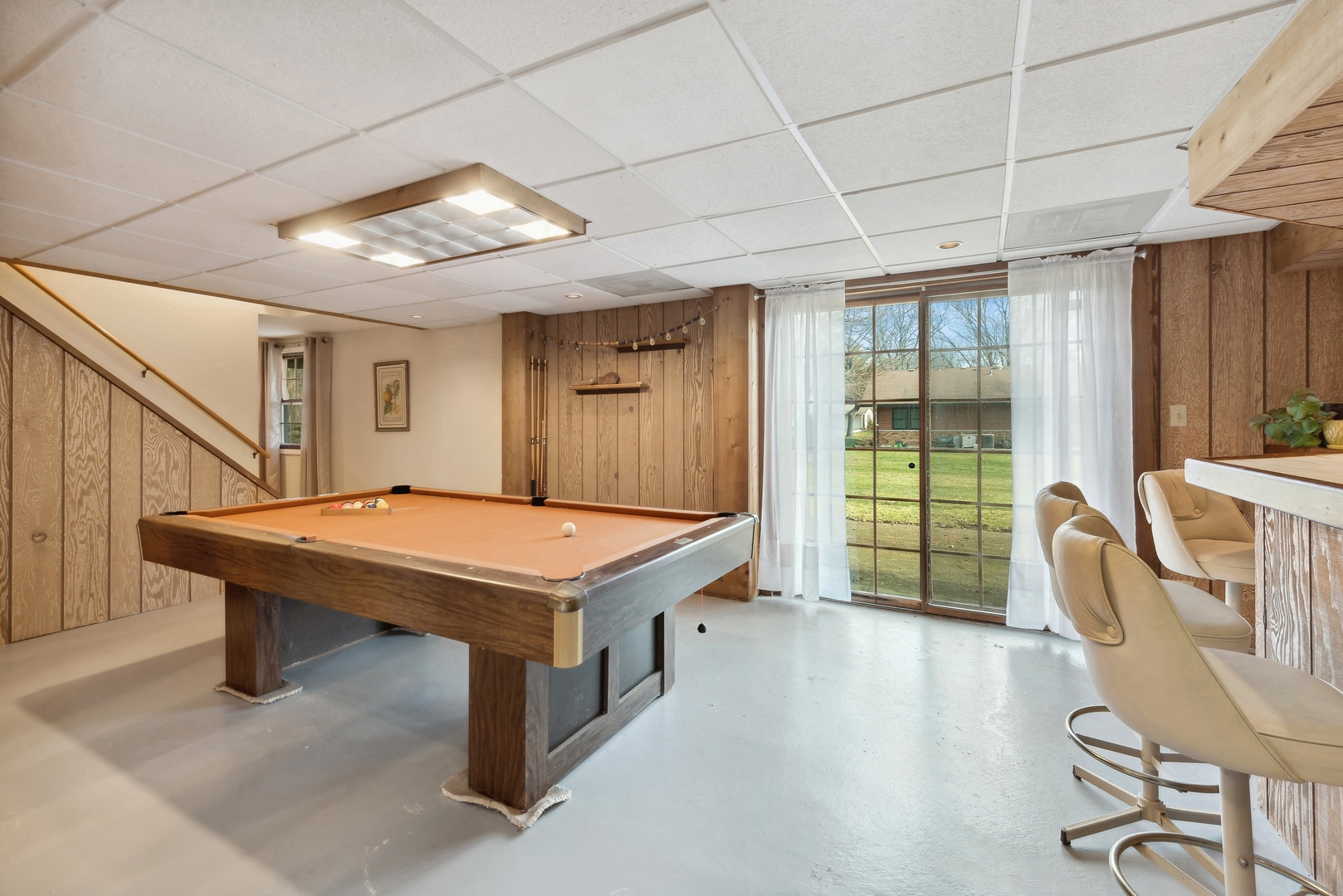 243 South Wulff Street Cary, IL 60013 - Photo 19 of 27 a room with pool table and windows