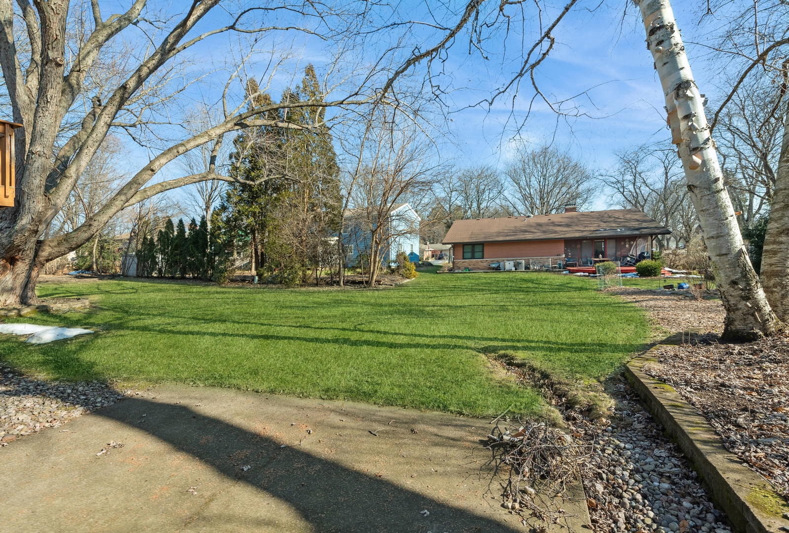 243 South Wulff Street Cary, IL 60013 - Photo 26 of 27 a front view of a house with garden