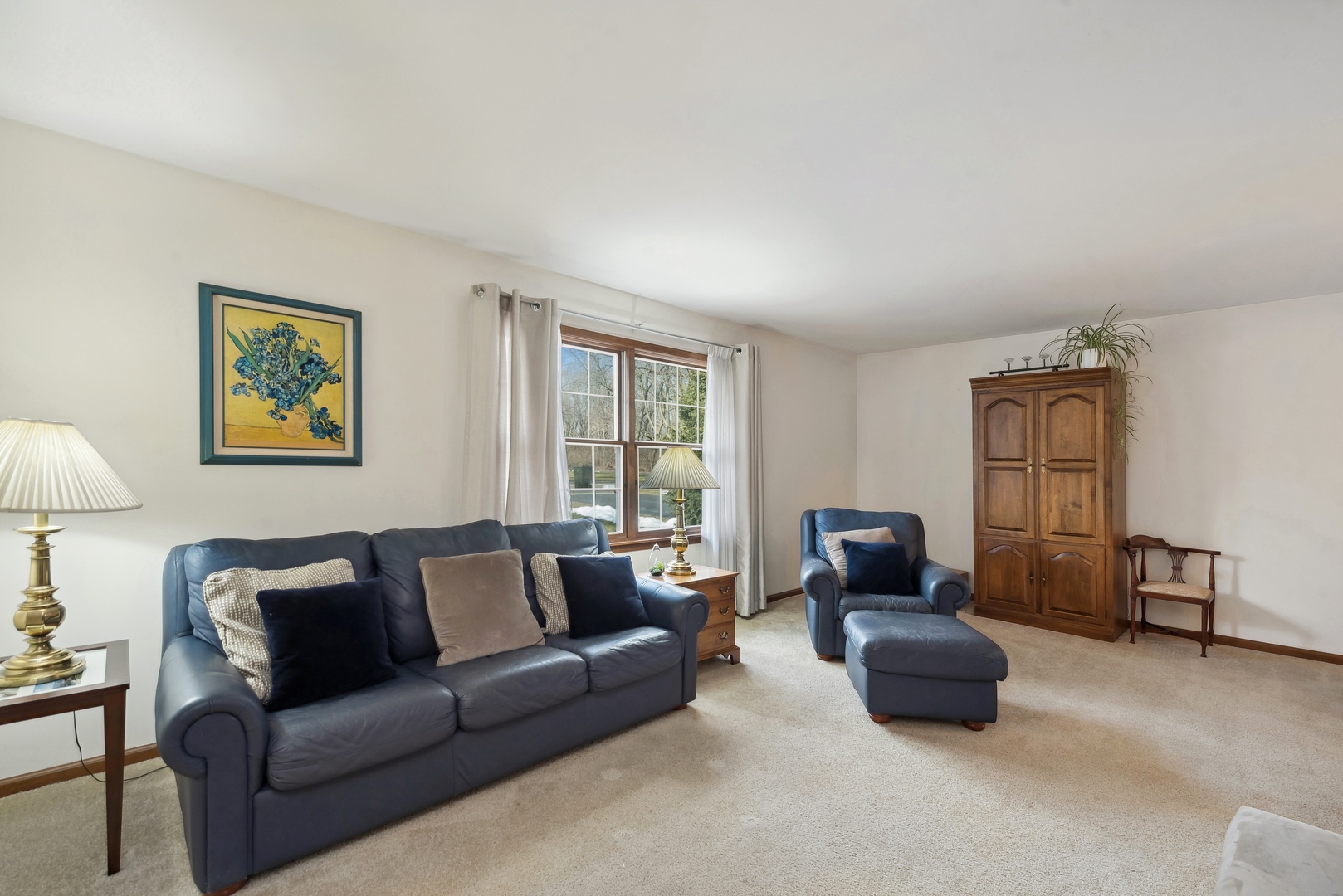 243 South Wulff Street Cary, IL 60013 - Photo 3 of 27 a living room with furniture and a window