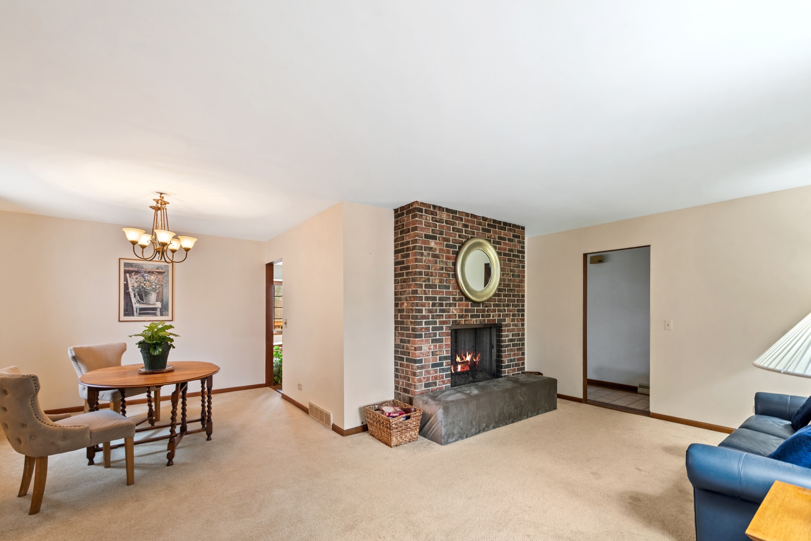 243 South Wulff Street Cary, IL 60013 - Photo 5 of 27 a view of a livingroom with furniture and a fireplace