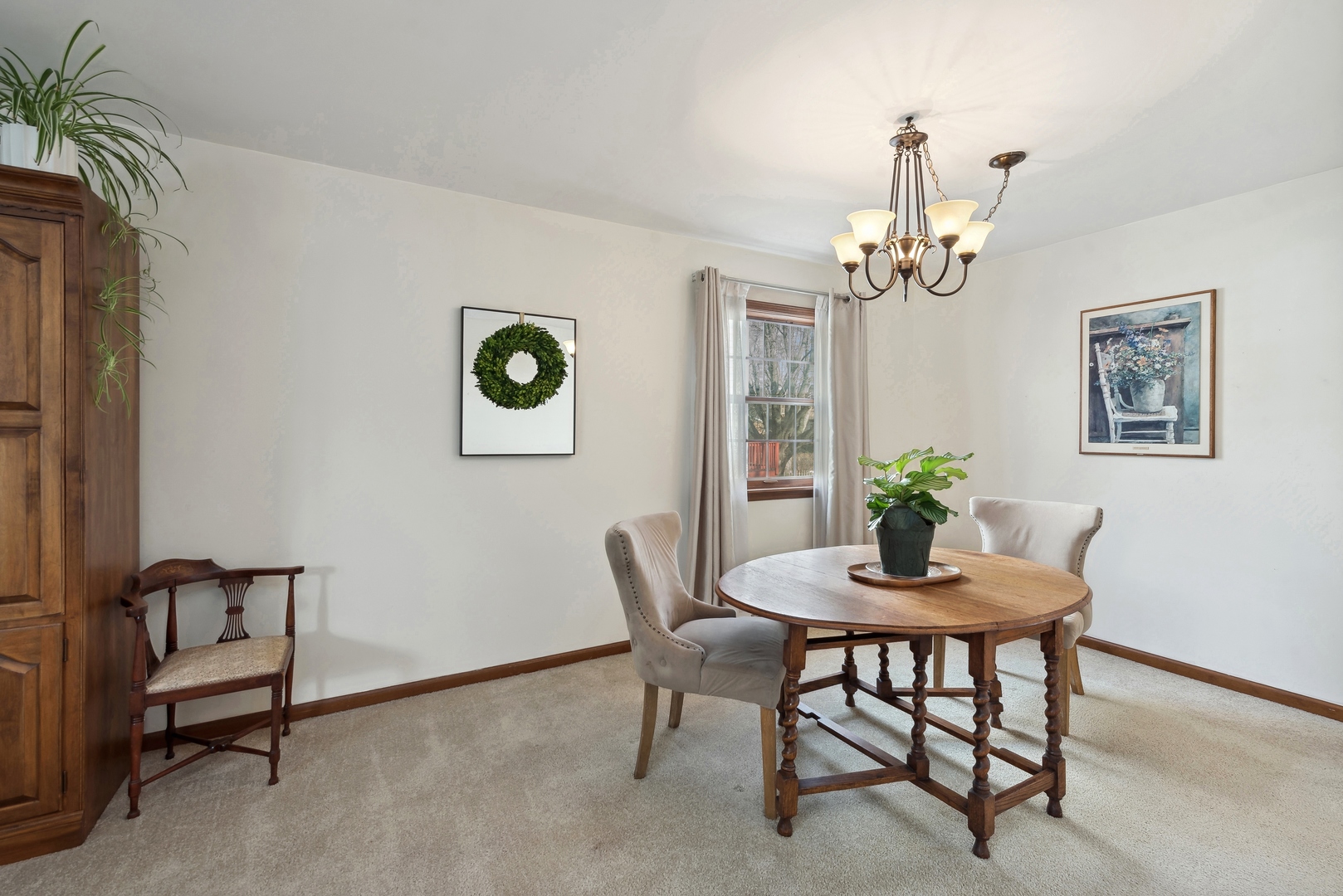 243 South Wulff Street Cary, IL 60013 - Photo 7 of 27 a view of a dining room with furniture and wooden floor