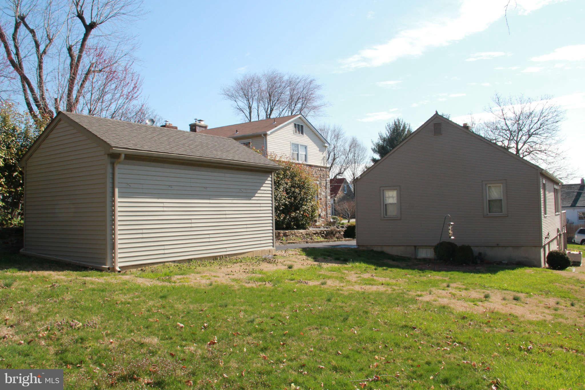 6502 Sharon Road Baltimore, MD 21239 - Photo 3 of 14 a house with a yard