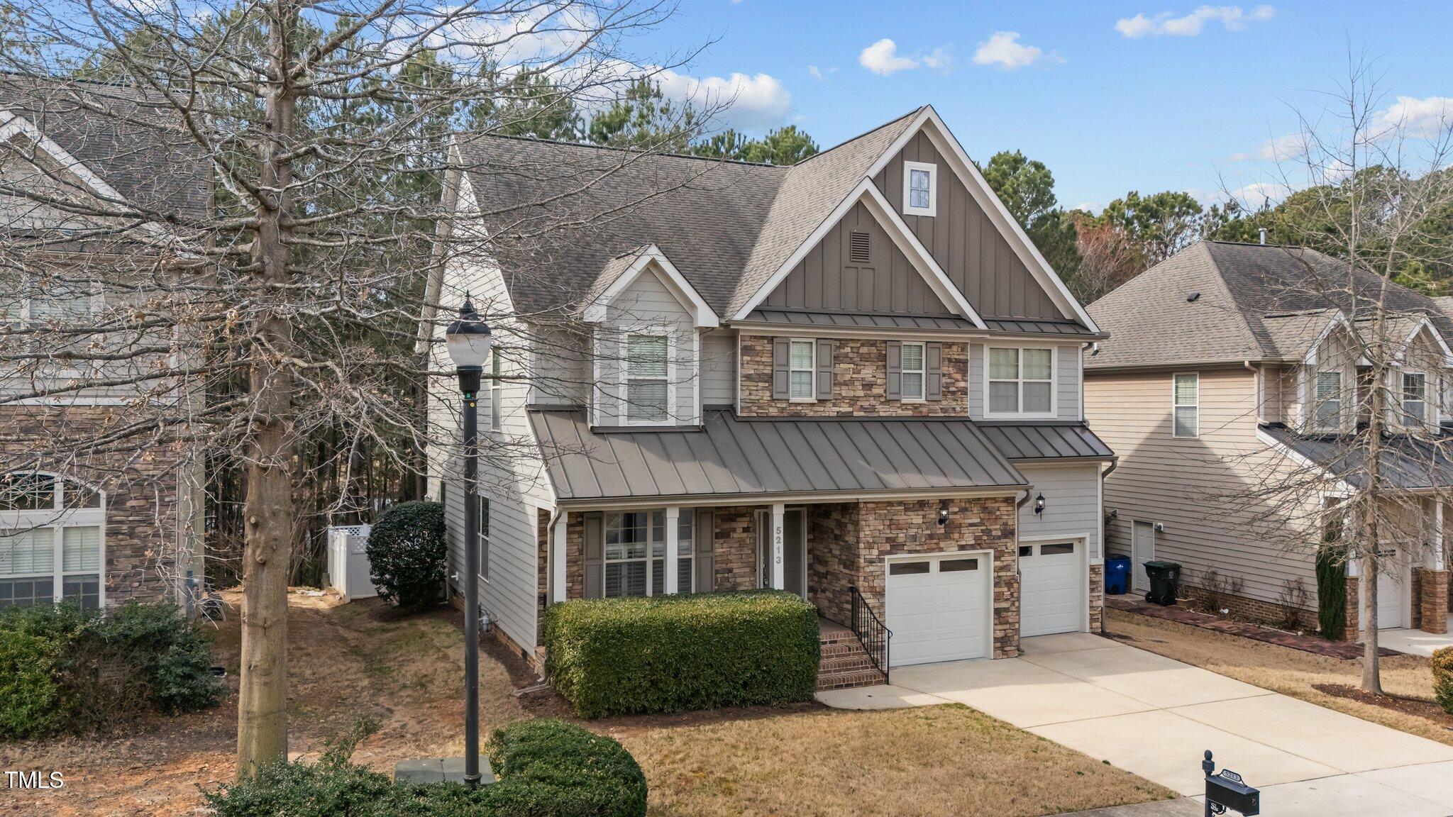 5213 Orabelle Court Raleigh, NC 27606 - Photo 2 of 60 3-web-or-mls-DJI_20250227113515_0804_D