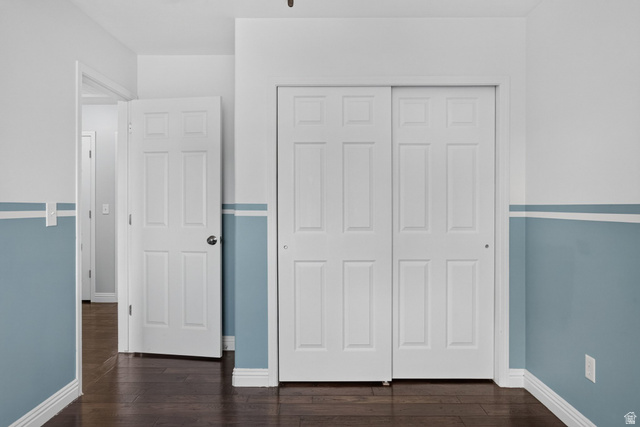 2223 North Pointe Meadow Loop Lehi, UT 84048 - Photo 30 of 56 Interior space featuring wood-finish flooring, two-tone painted walls with a chair rail, and white baseboards