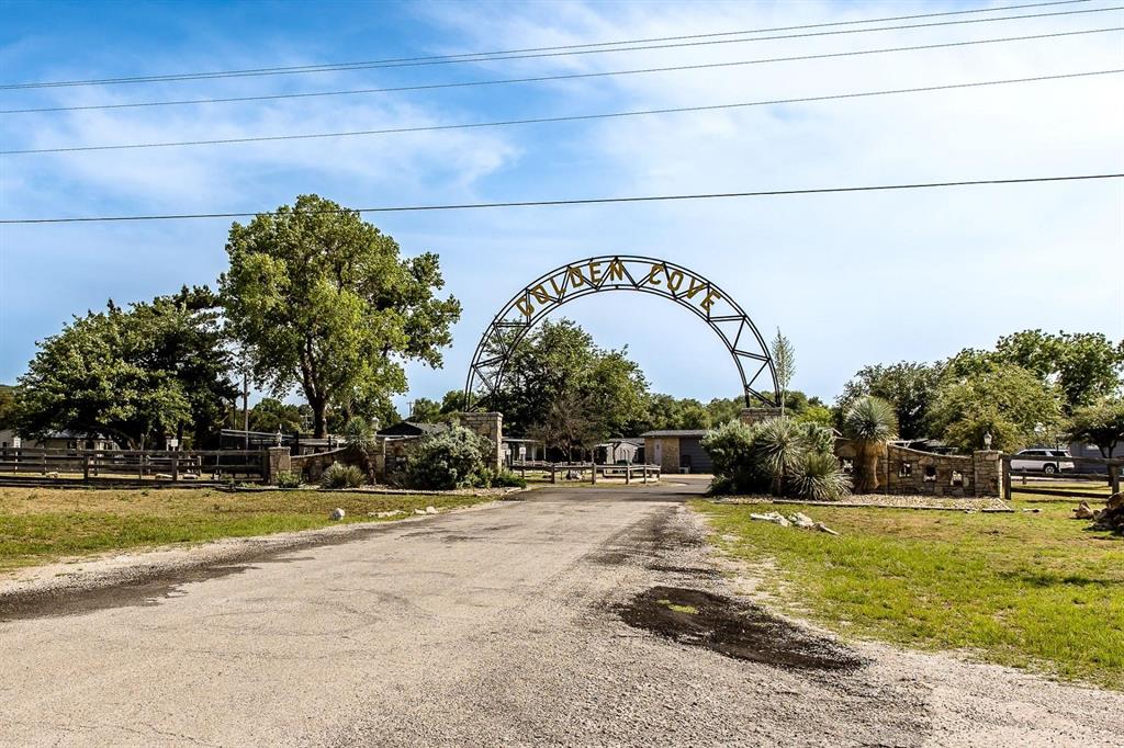 2334 San Bar Road, Unit 104 Graford, TX 76449 - Photo 30 of 31 Hurry to Golden Cove ~ your Lake Place awaits beyond this gate!
