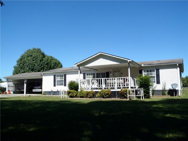 391 Sims Spring Road Shelbyville, TN 37160 - Photo 1 of 18 Welcome to 391 Sims Springs Road.. this lovely 3 bedroom, 2 bath home is sitting on almost 11 acres with a barn and pond.. Come check it out..