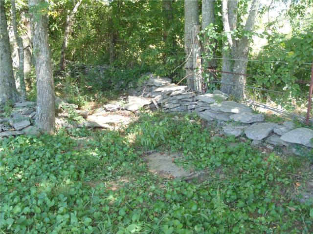 391 Sims Spring Road Shelbyville, TN 37160 - Photo 3 of 18 Old stone fence