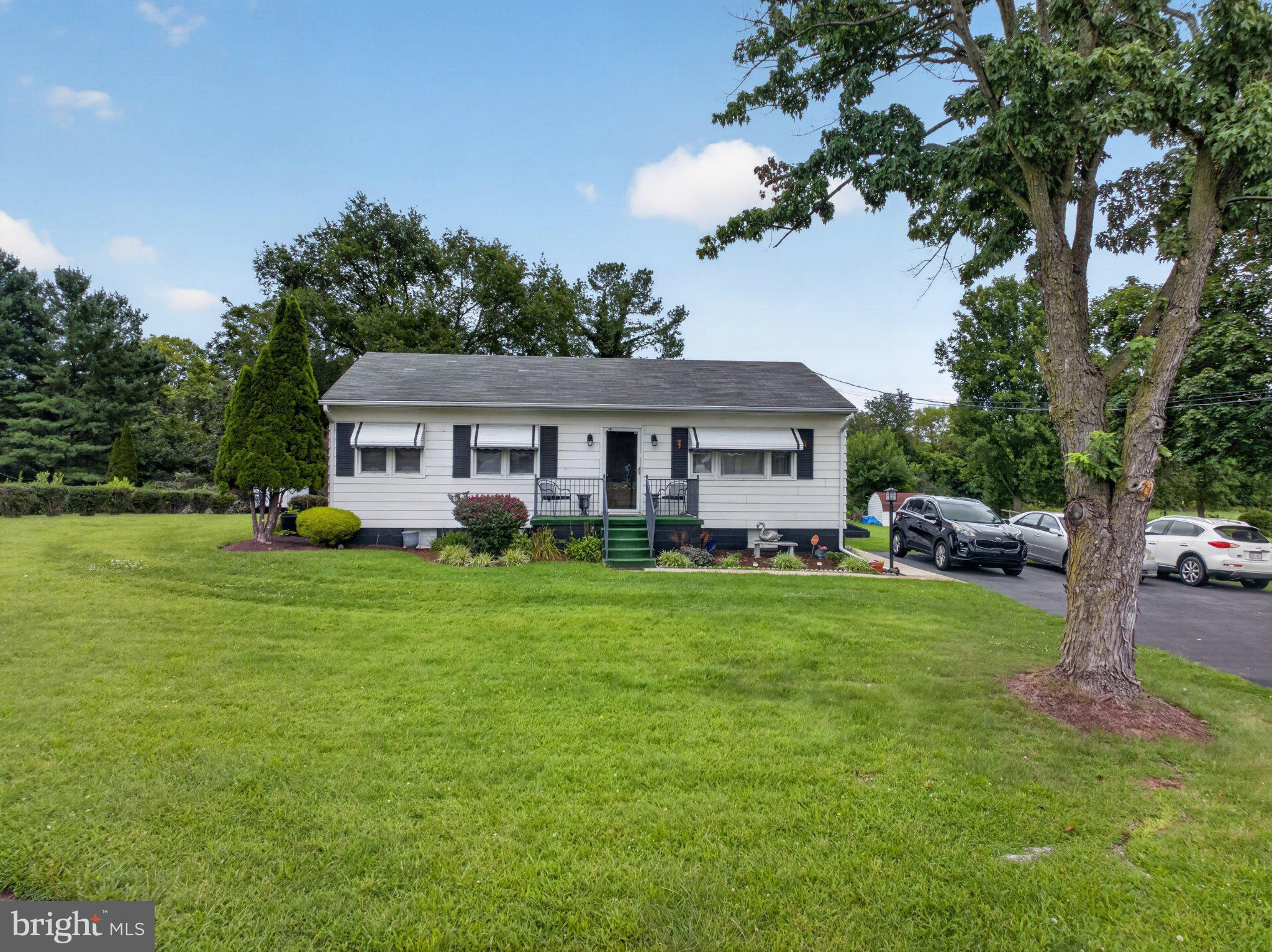 9005 Charles Town Road Ranson, WV 25438 - Photo 2 of 31 Charming home on lush green lawn.