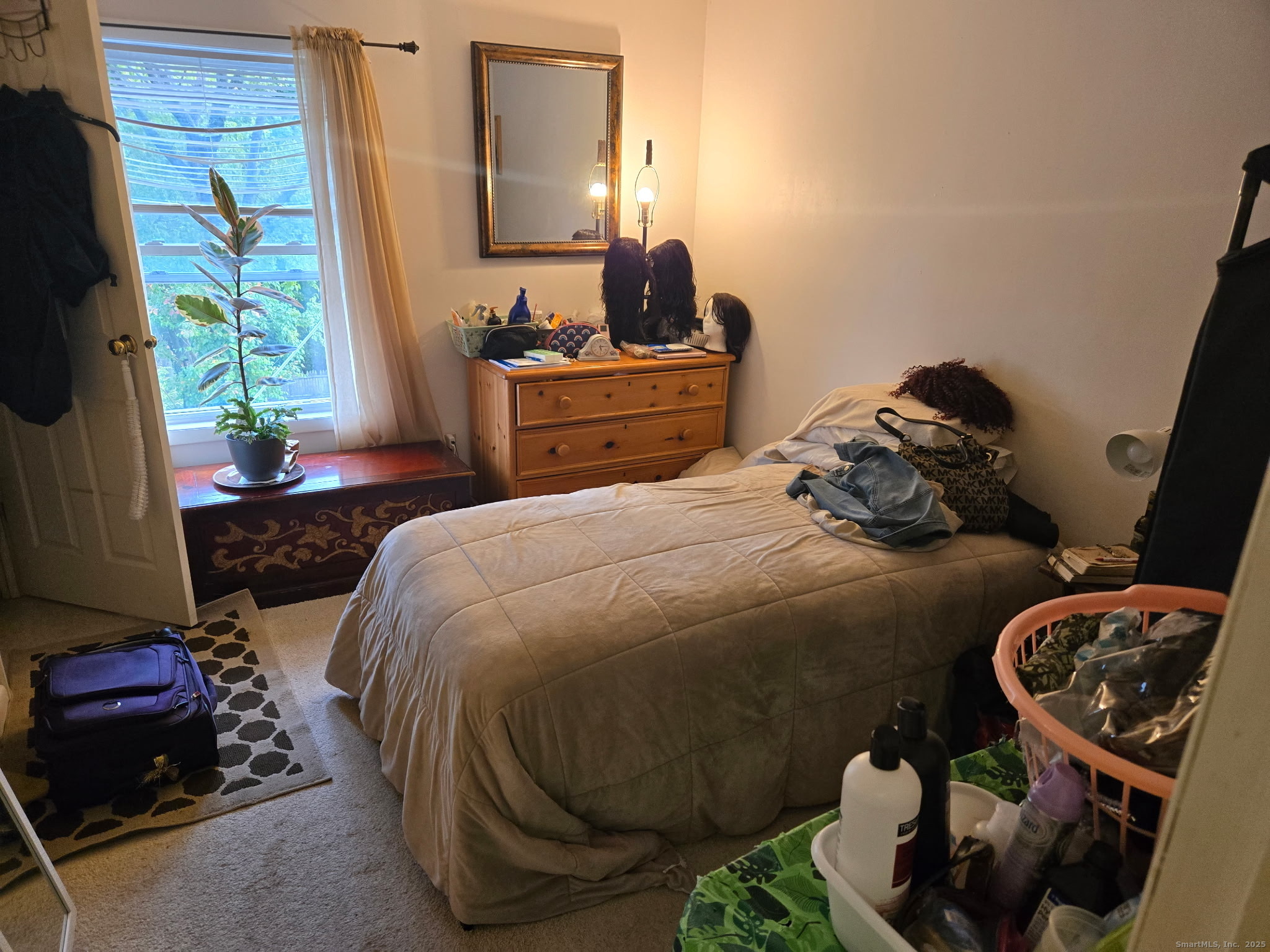 93 Spruce Street, Unit 11 Stamford, CT 06902 - Photo 6 of 6 a bedroom with a bed and a window