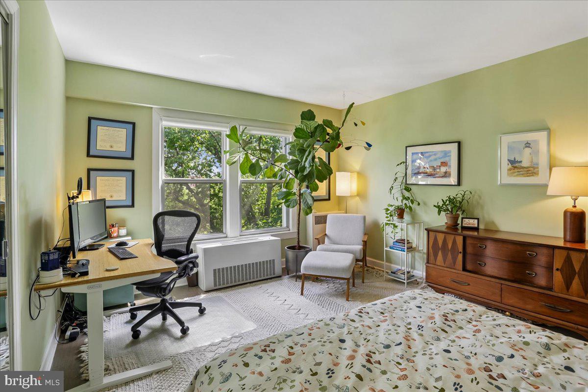 2500 Q Street Northwest, Unit 605 Washington, DC 20007 - Photo 22 of 48 a view of a livingroom with workspace and a couch