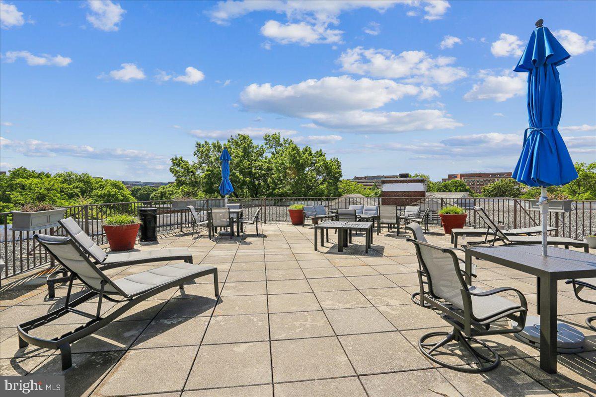 2500 Q Street Northwest, Unit 605 Washington, DC 20007 - Photo 27 of 48 a view of a terrace with furniture