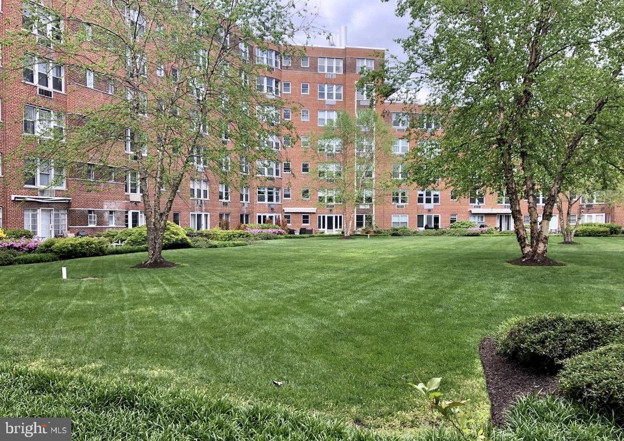 2500 Q Street Northwest, Unit 605 Washington, DC 20007 - Photo 40 of 48 a view of a building with a yard