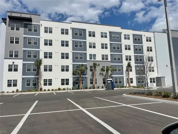a view of a building with a street