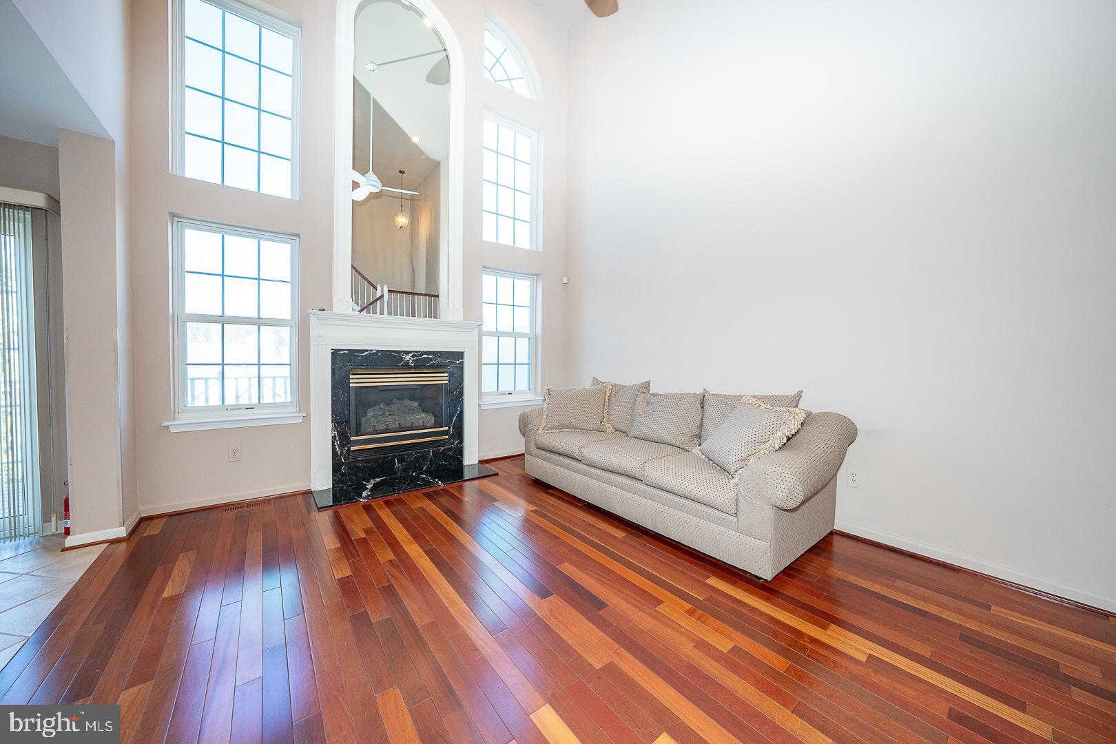 234 Lookout Place Wayne, PA 19087 - Photo 11 of 32 a living room with furniture a fireplace and wooden floor