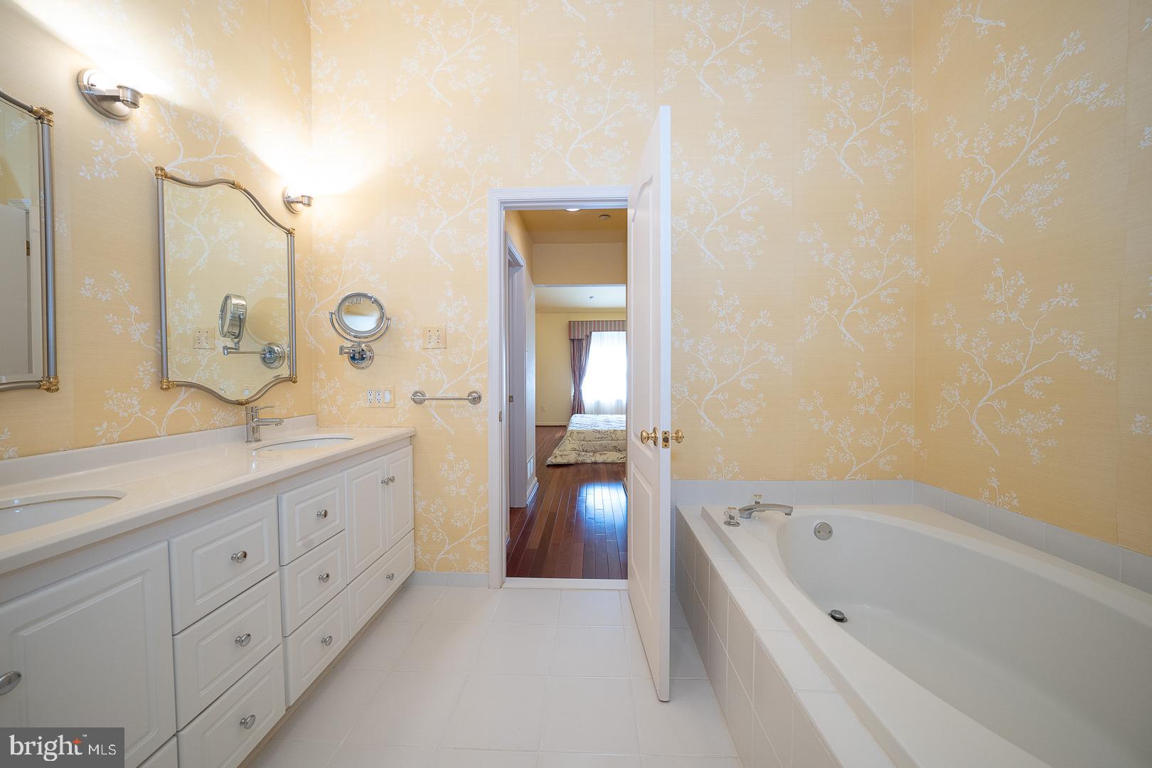 234 Lookout Place Wayne, PA 19087 - Photo 16 of 32 a bathroom with a bathtub and a sink