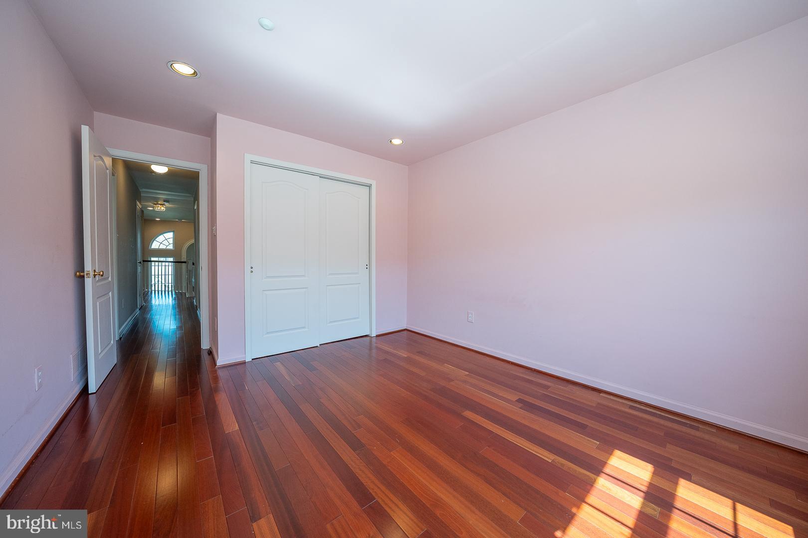 234 Lookout Place Wayne, PA 19087 - Photo 20 of 32 a view of empty room with wooden floor and fan