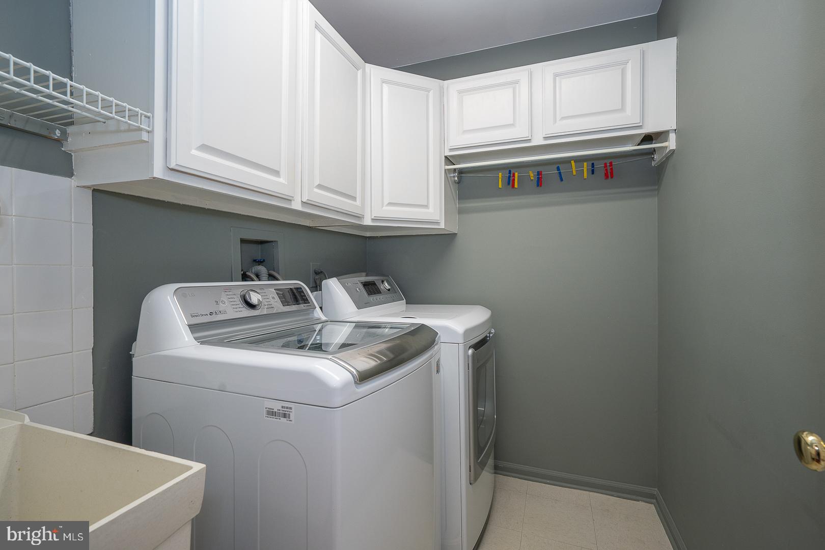 234 Lookout Place Wayne, PA 19087 - Photo 22 of 32 a utility room with dryer and washer