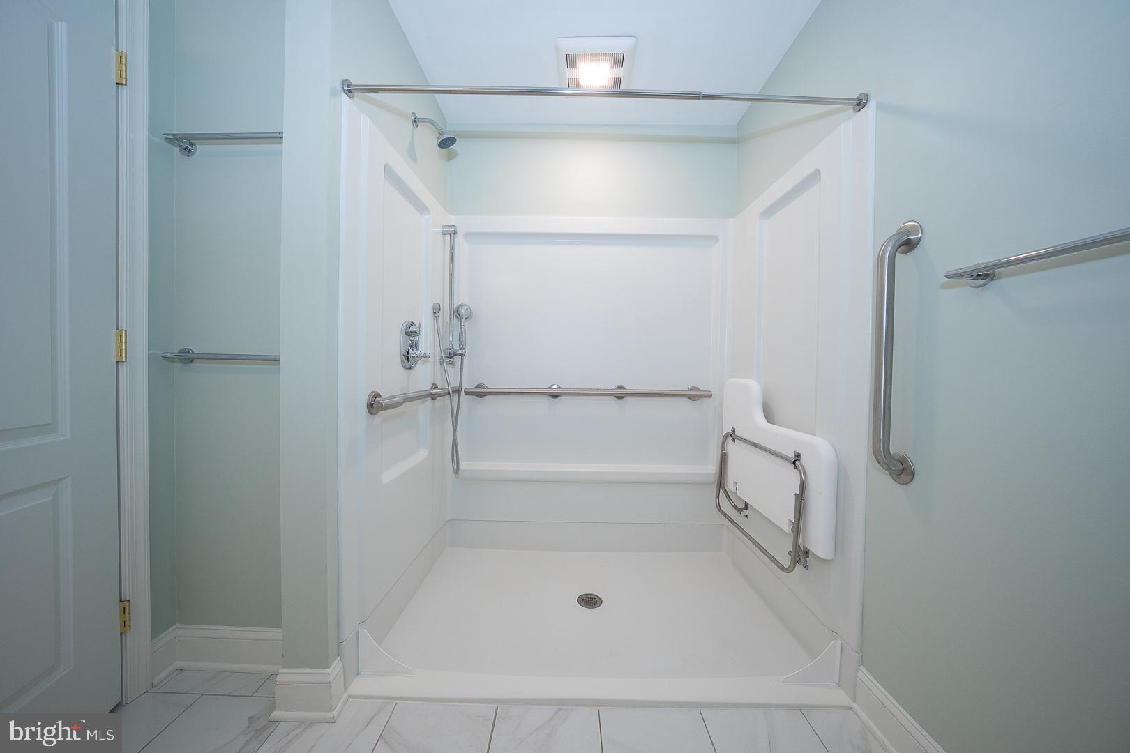 234 Lookout Place Wayne, PA 19087 - Photo 29 of 32 a bathroom with a bathtub and a shower