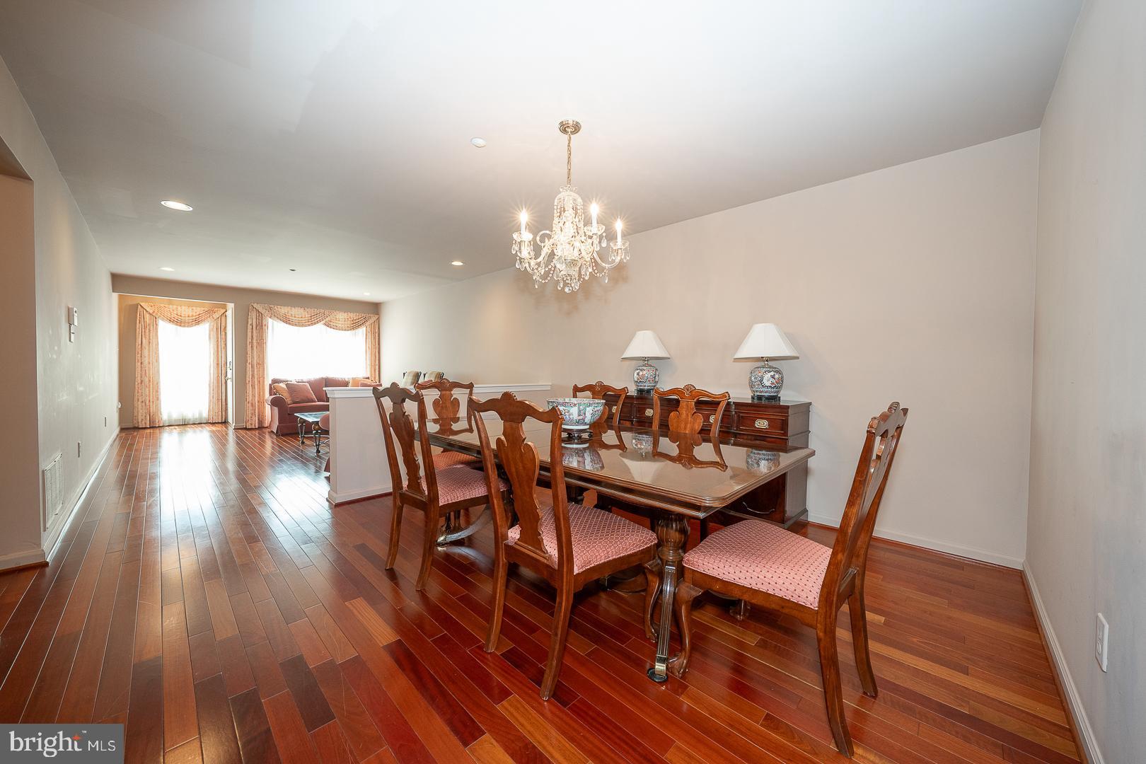 234 Lookout Place Wayne, PA 19087 - Photo 3 of 32 a view of a dining room with furniture and wooden floor